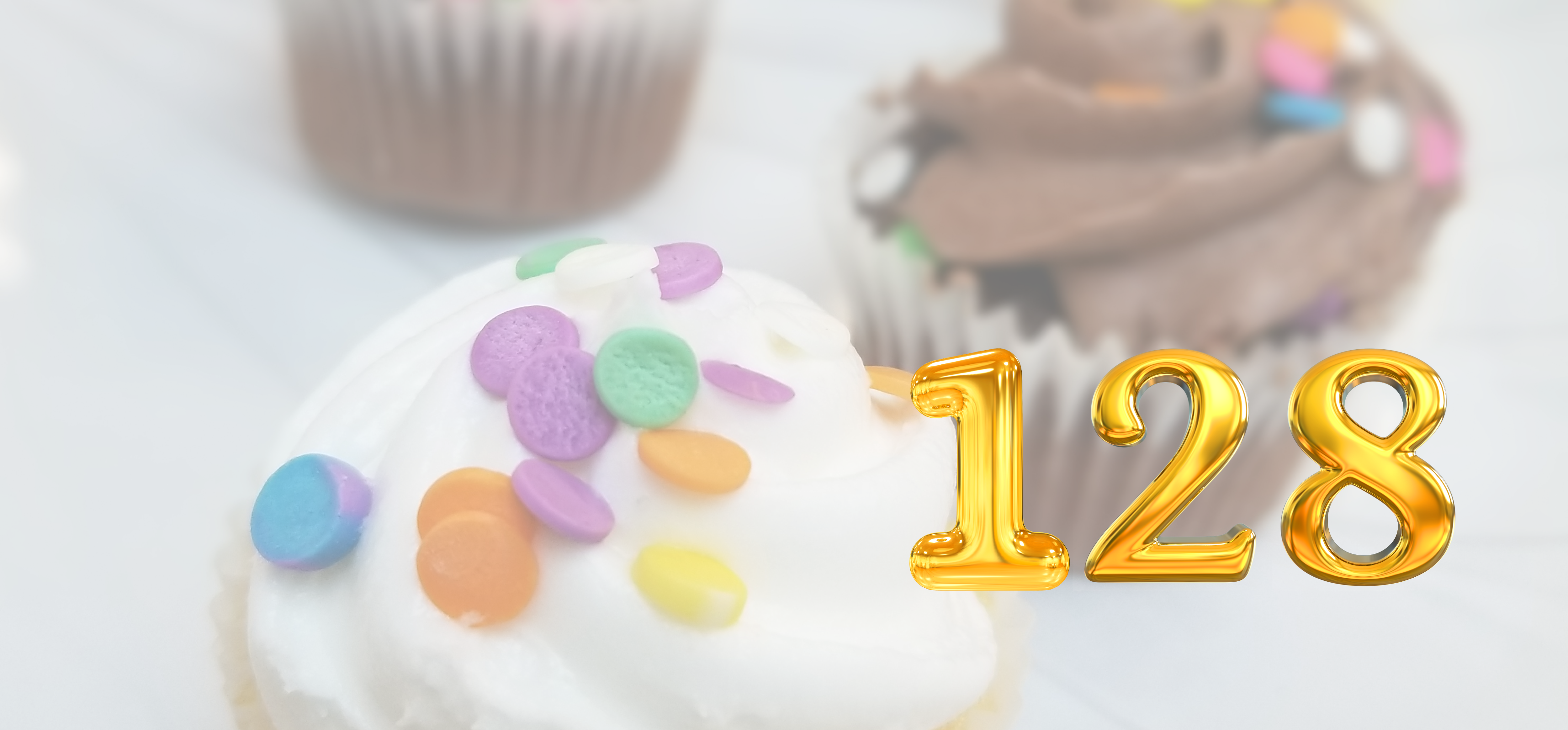 Cupcakes with sprinkles and 128 in gold 