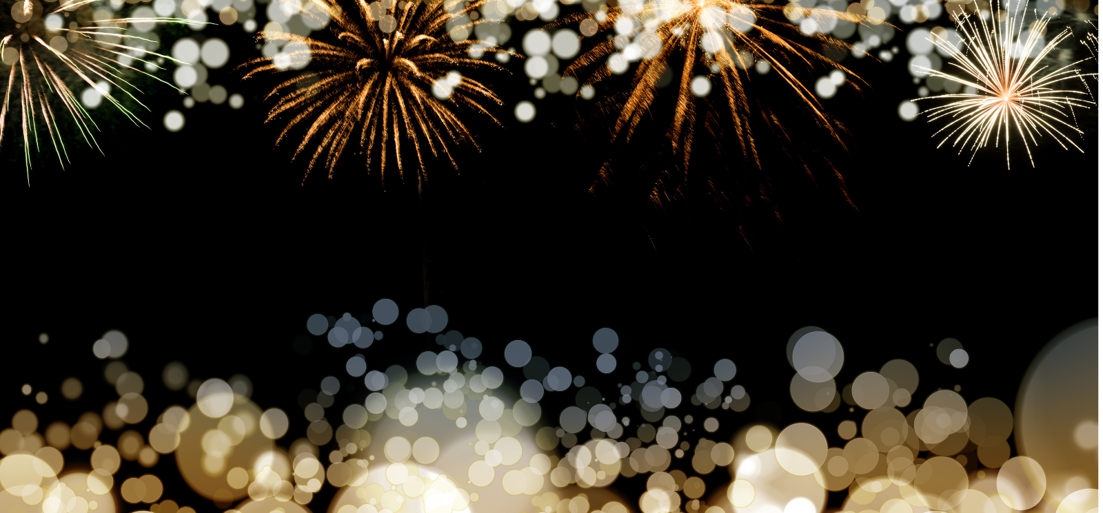 gold fireworks and solar flares in front of a black background